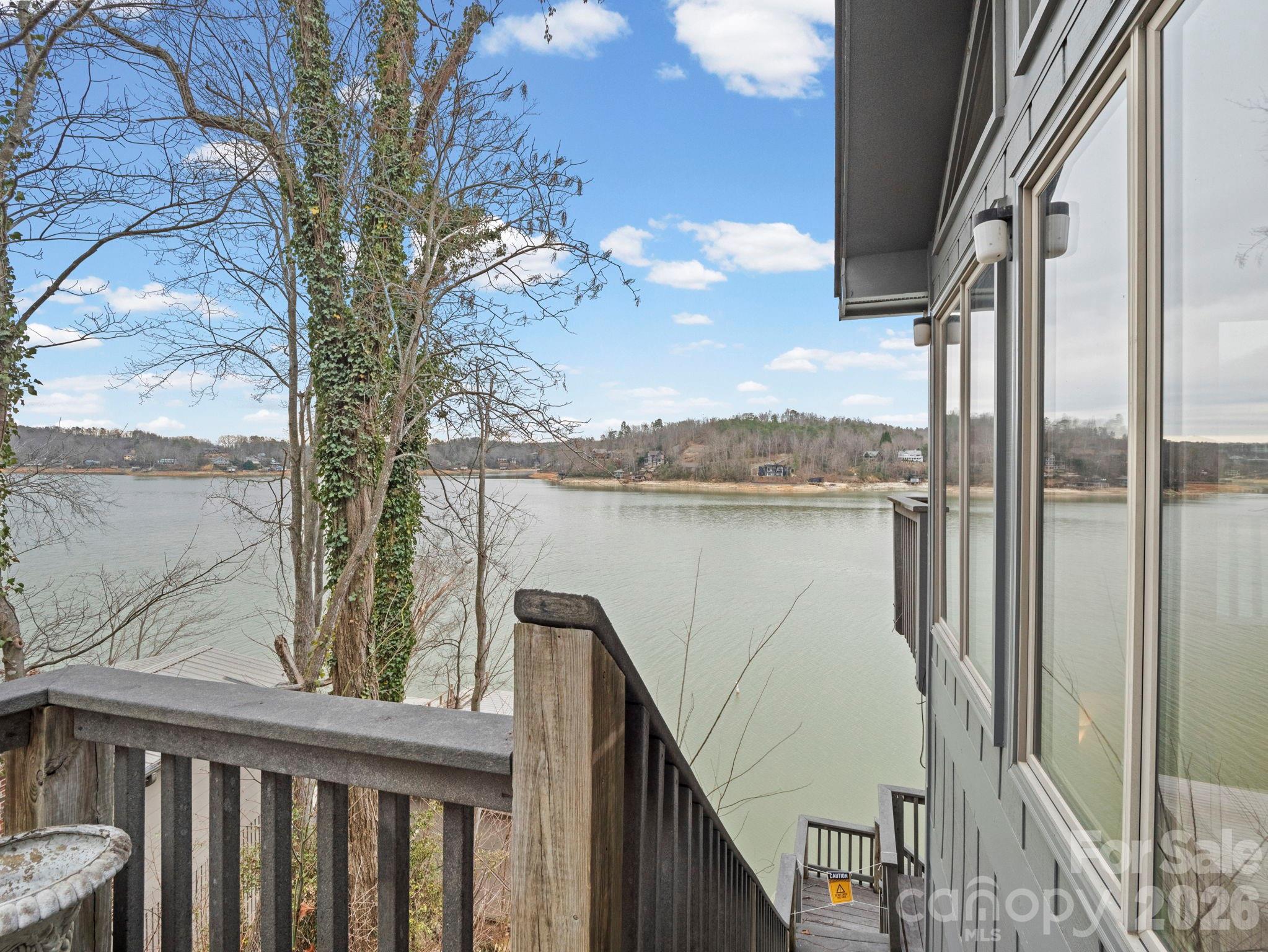 336 Burnt Ridge Road Lake Lure, NC 28746 - Photo 15 of 45 a view of a balcony with an ocean view