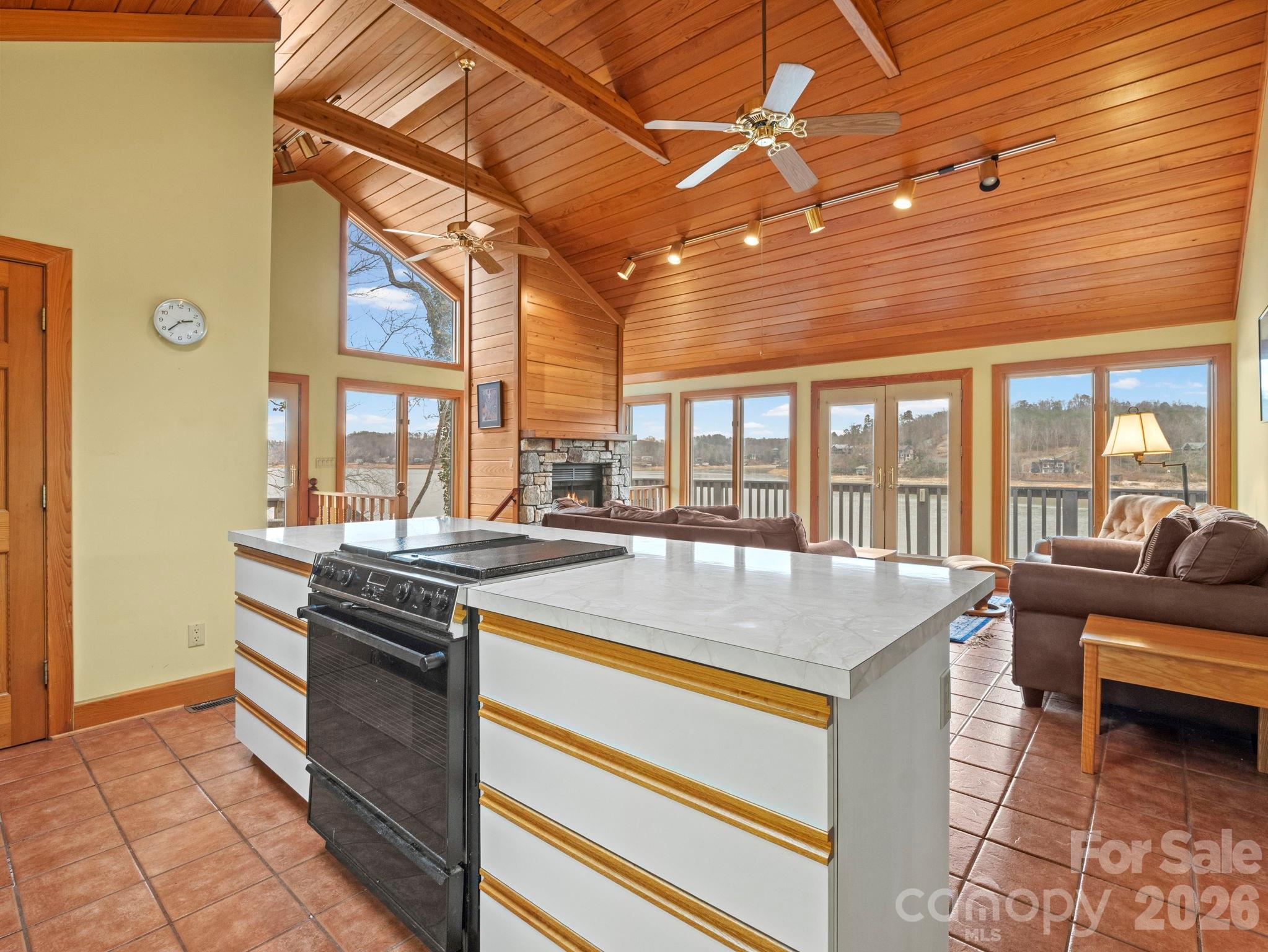 336 Burnt Ridge Road Lake Lure, NC 28746 - Photo 20 of 45 a kitchen with a stove and a sink