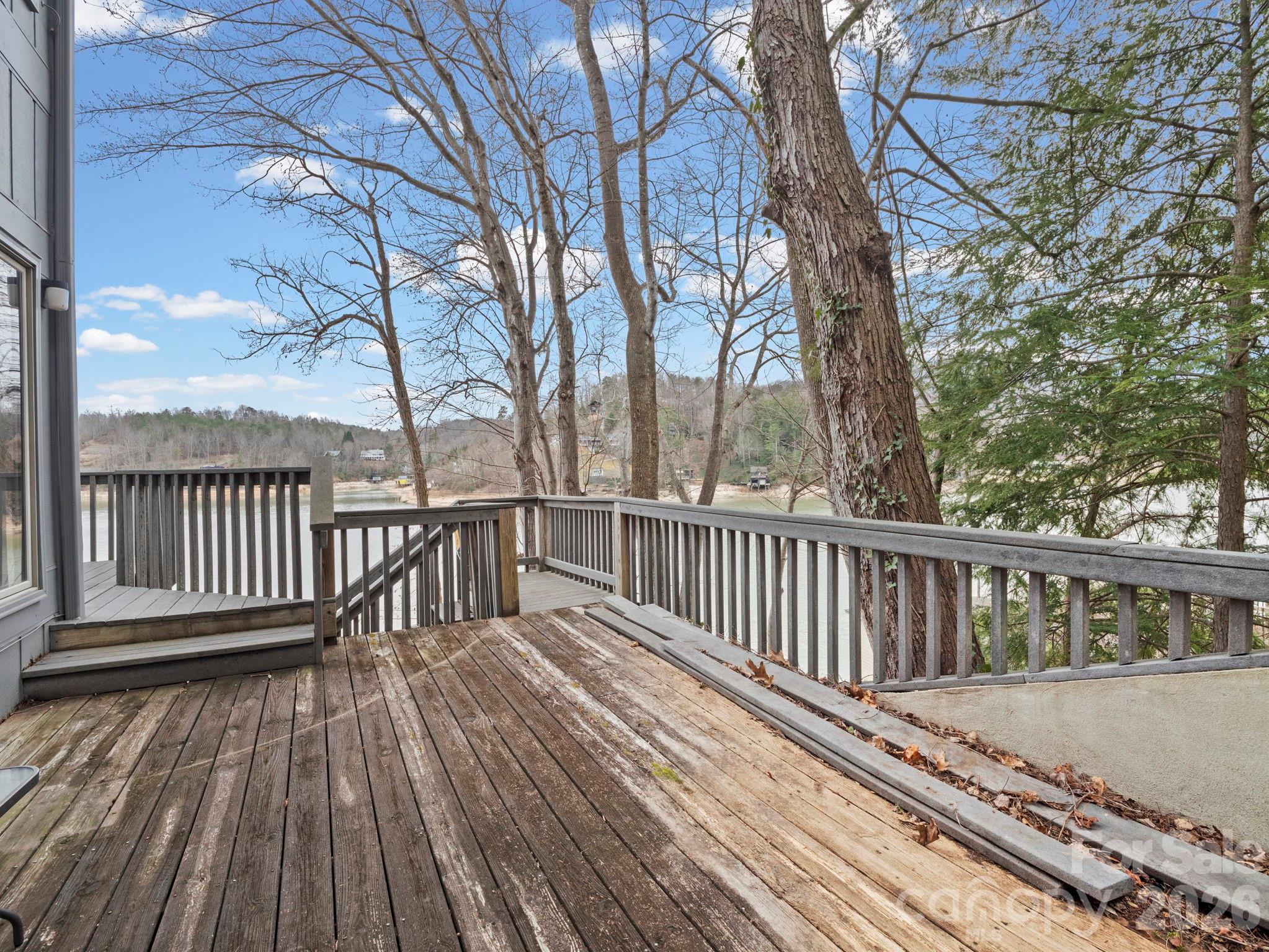 336 Burnt Ridge Road Lake Lure, NC 28746 - Photo 41 of 45 a view of balcony with wooden floor and fence