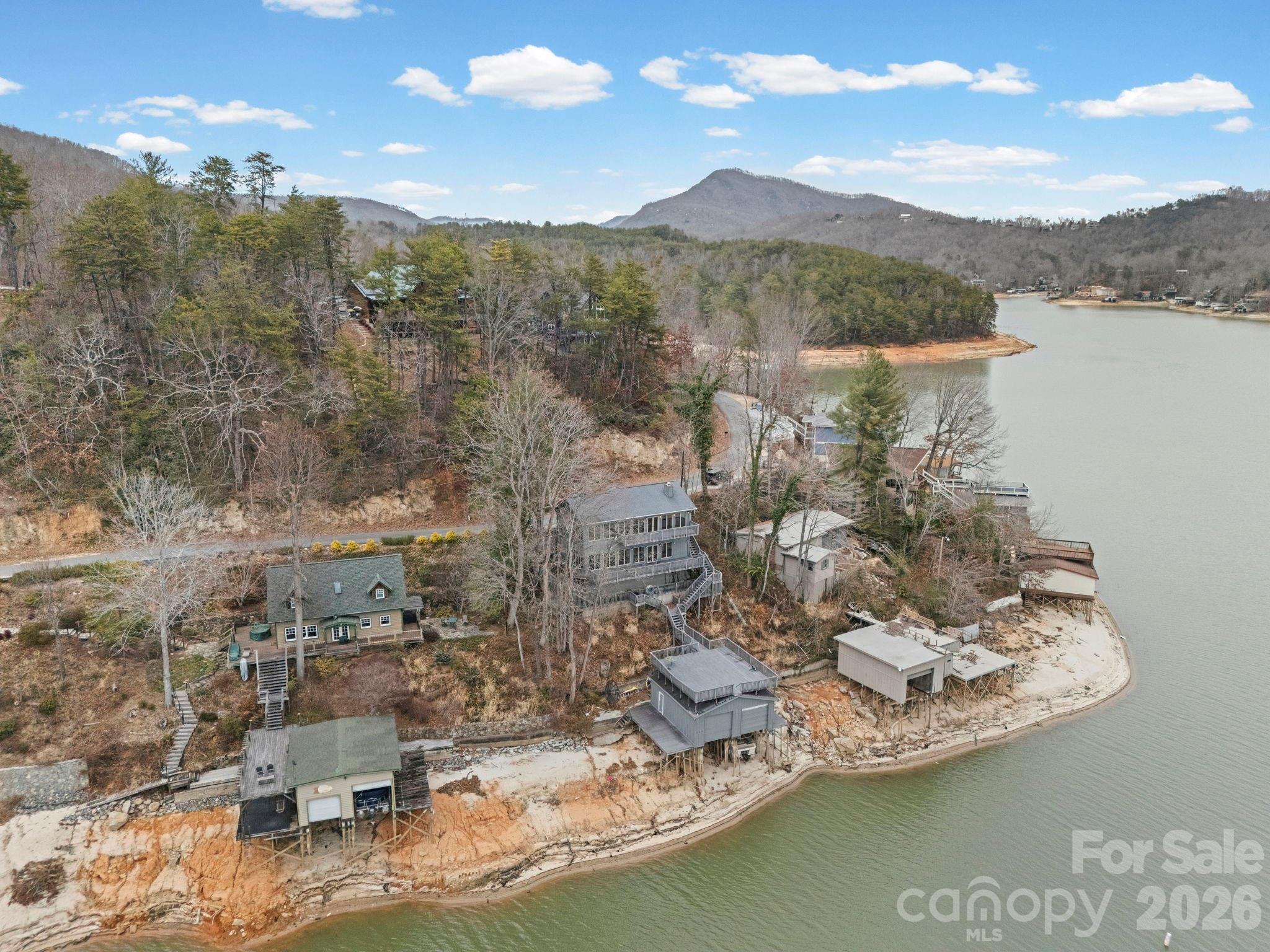 336 Burnt Ridge Road Lake Lure, NC 28746 - Photo 5 of 45 a view of a water with a mountain view