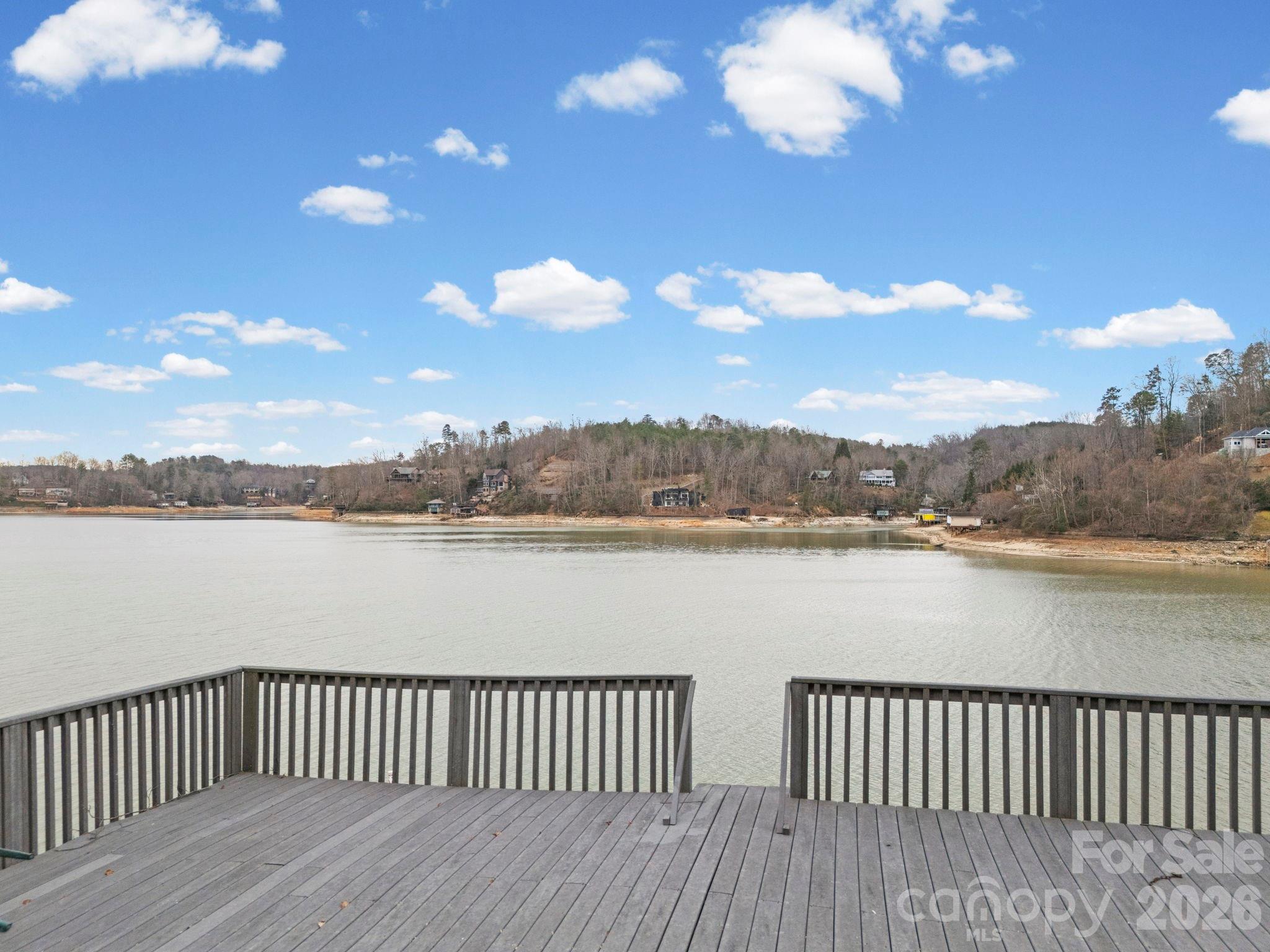 336 Burnt Ridge Road Lake Lure, NC 28746 - Photo 9 of 45 a view of city and a lake