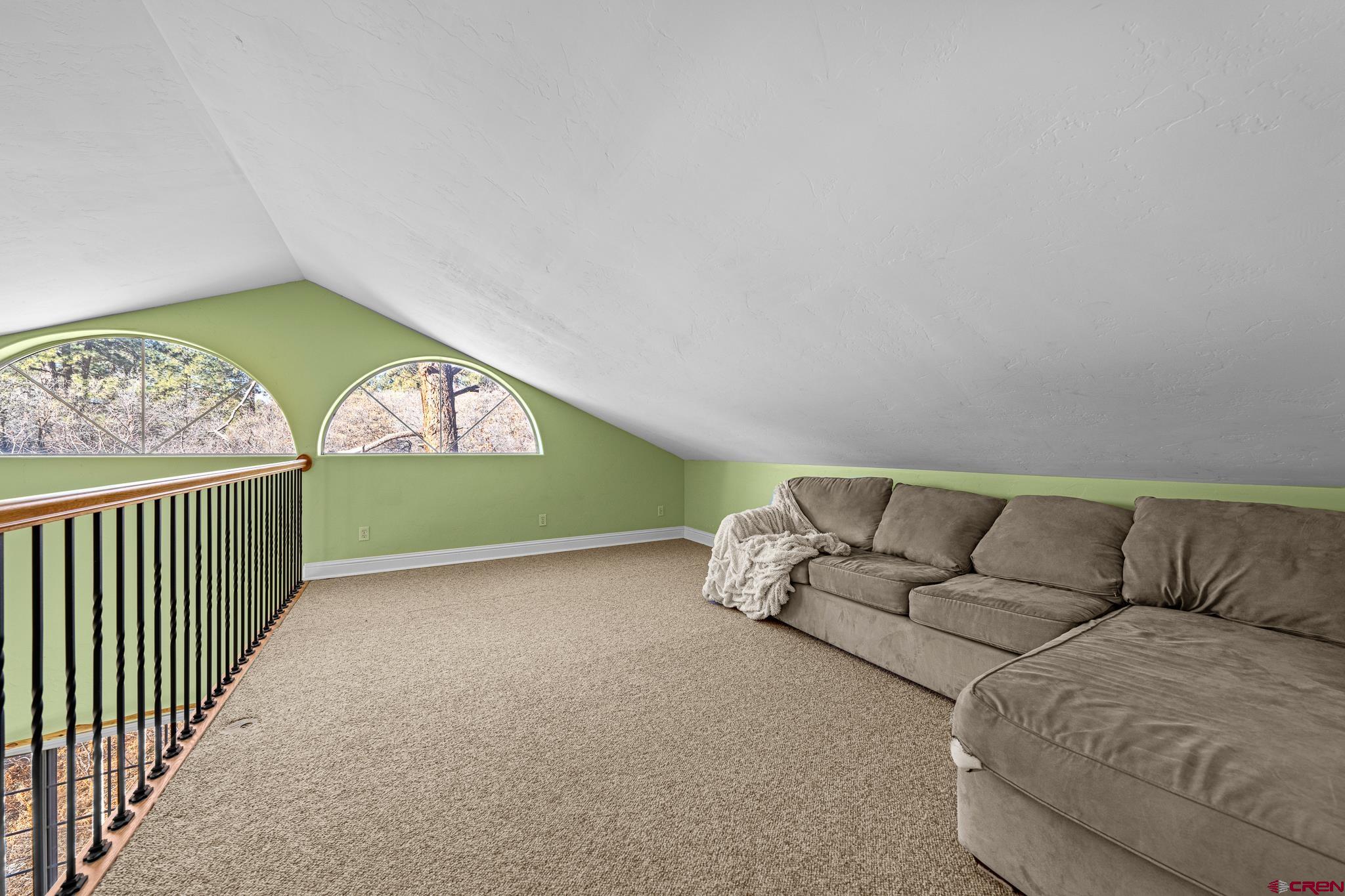 700 Blue Ridge Drive Bayfield, CO 81122 - Photo 23 of 30 a living room with furniture and a window