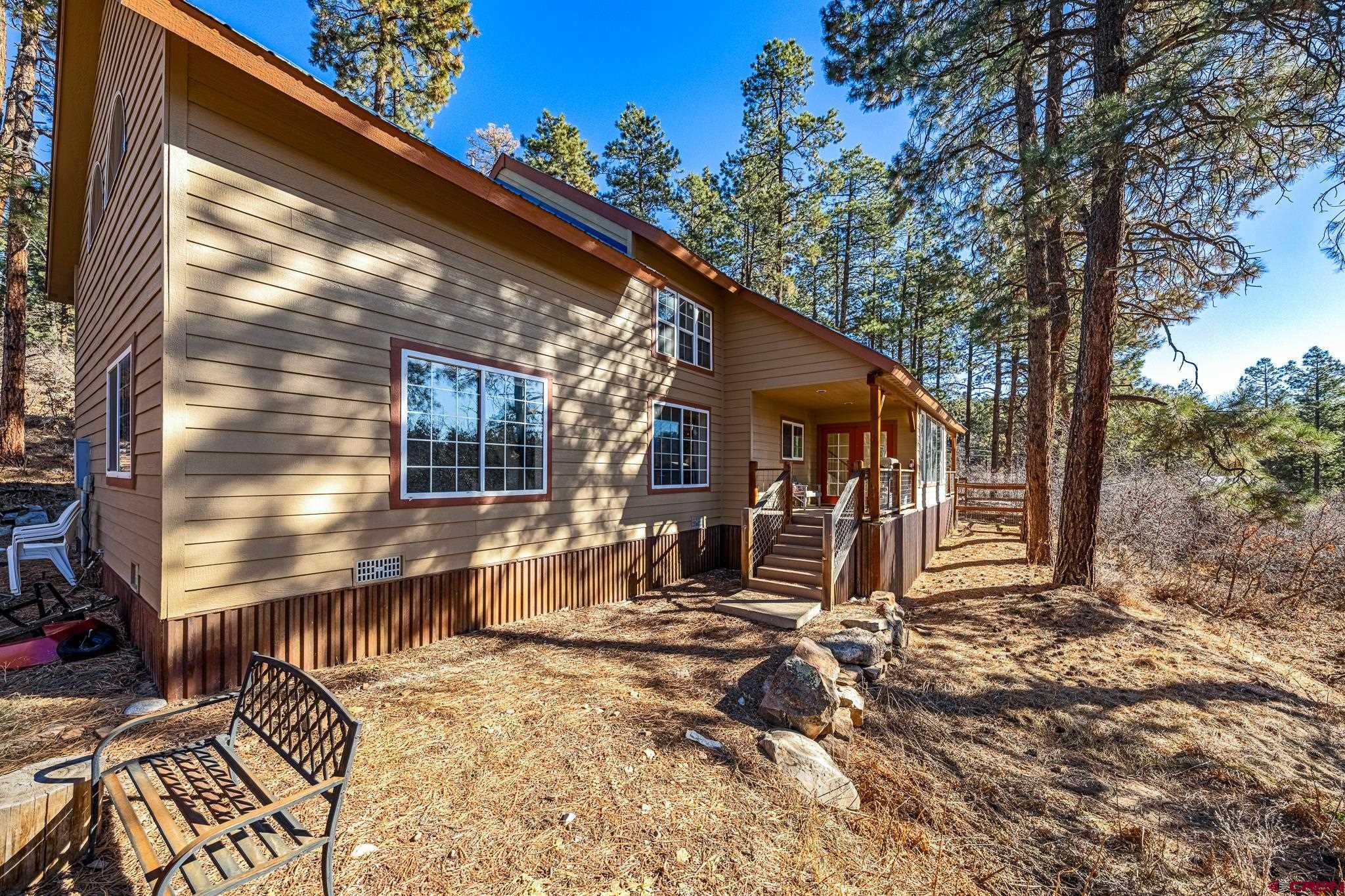700 Blue Ridge Drive Bayfield, CO 81122 - Photo 4 of 30 a view of backyard with wooden fence