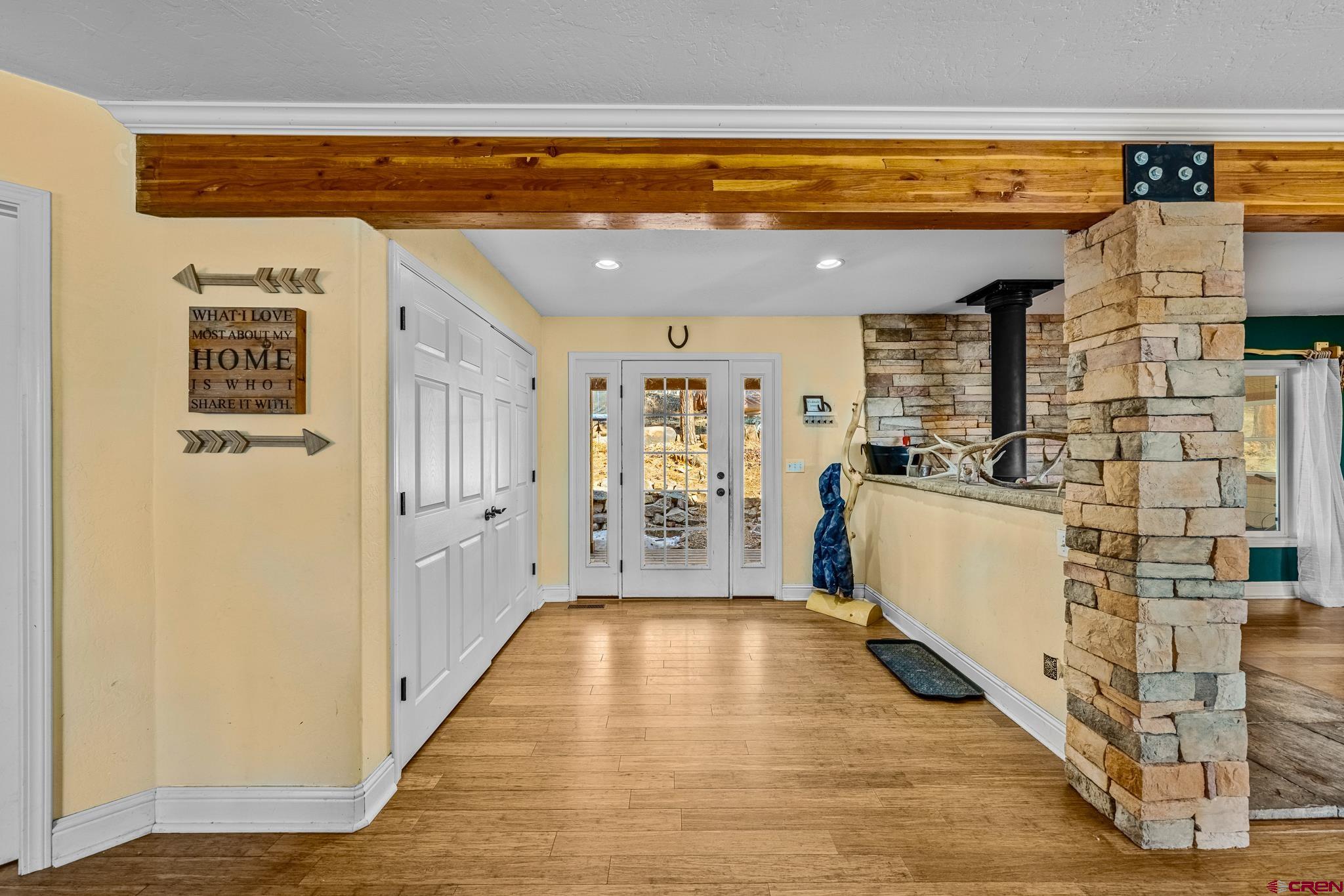 700 Blue Ridge Drive Bayfield, CO 81122 - Photo 6 of 30 a view of a kitchen with furniture and wooden floor