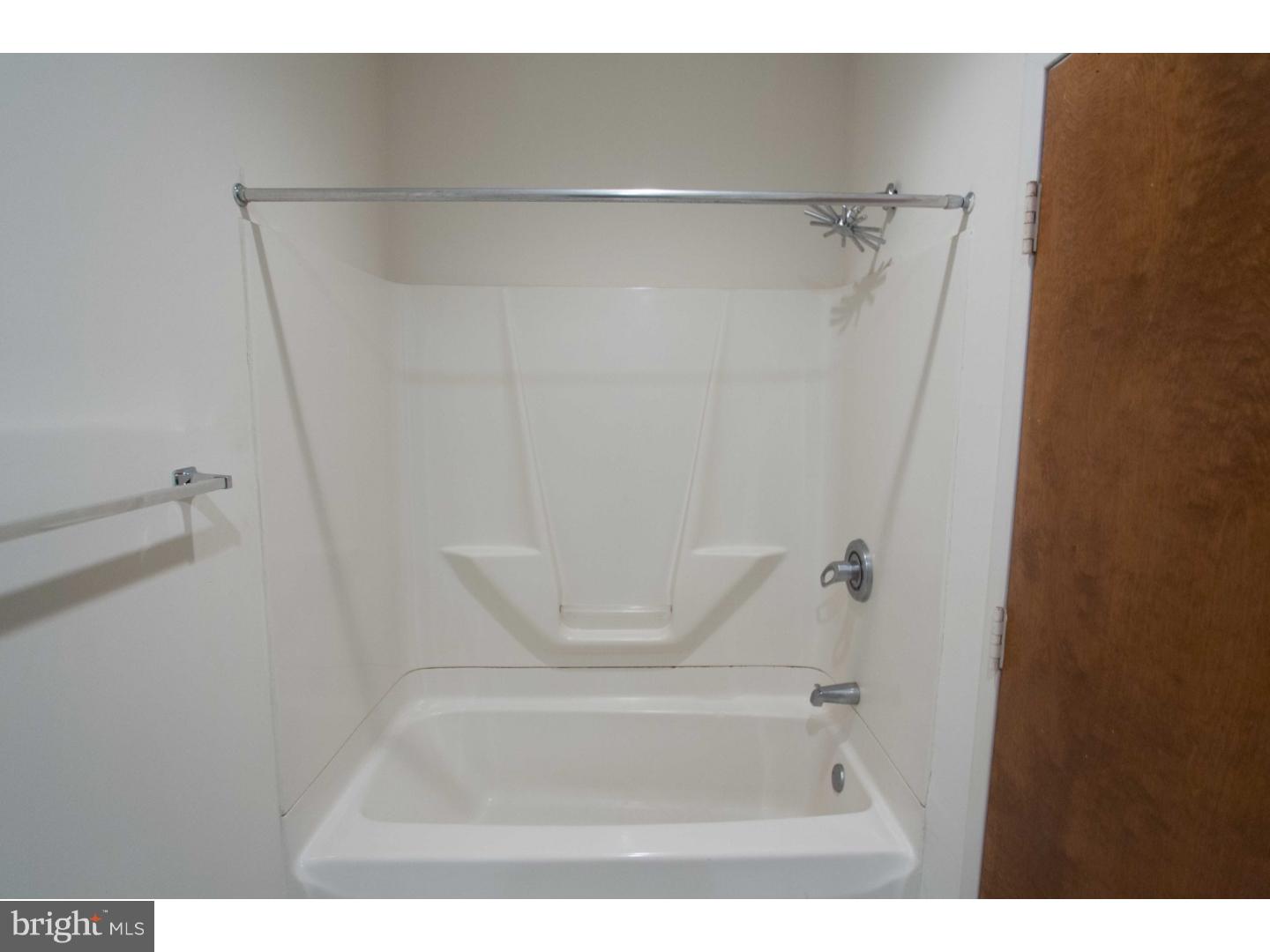 1411-3 Walnut Street, Unit 502 Philadelphia, PA 19102 - Photo 14 of 15 a bathroom with a shower