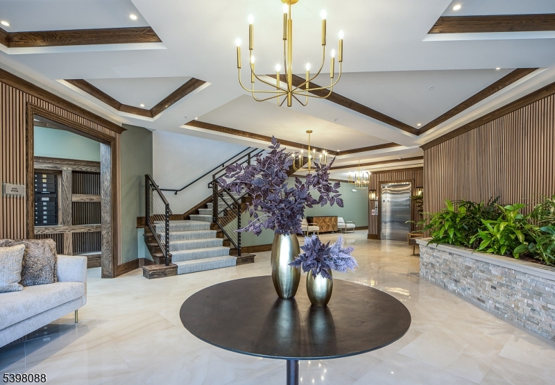 663 Springfield Avenue, Unit 53 Berkeley Heights, NJ 07922 - Photo 4 of 14 a view of a patio with a table and chairs