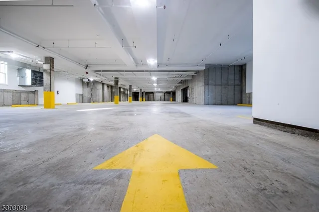 a room with gym equipment and a large window
