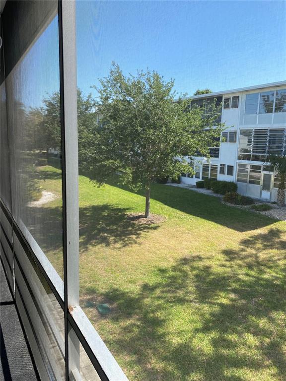 8455 112th Street North, Unit 212 Seminole, FL 33772 - Photo 14 of 21 a view of swimming pool from a balcony