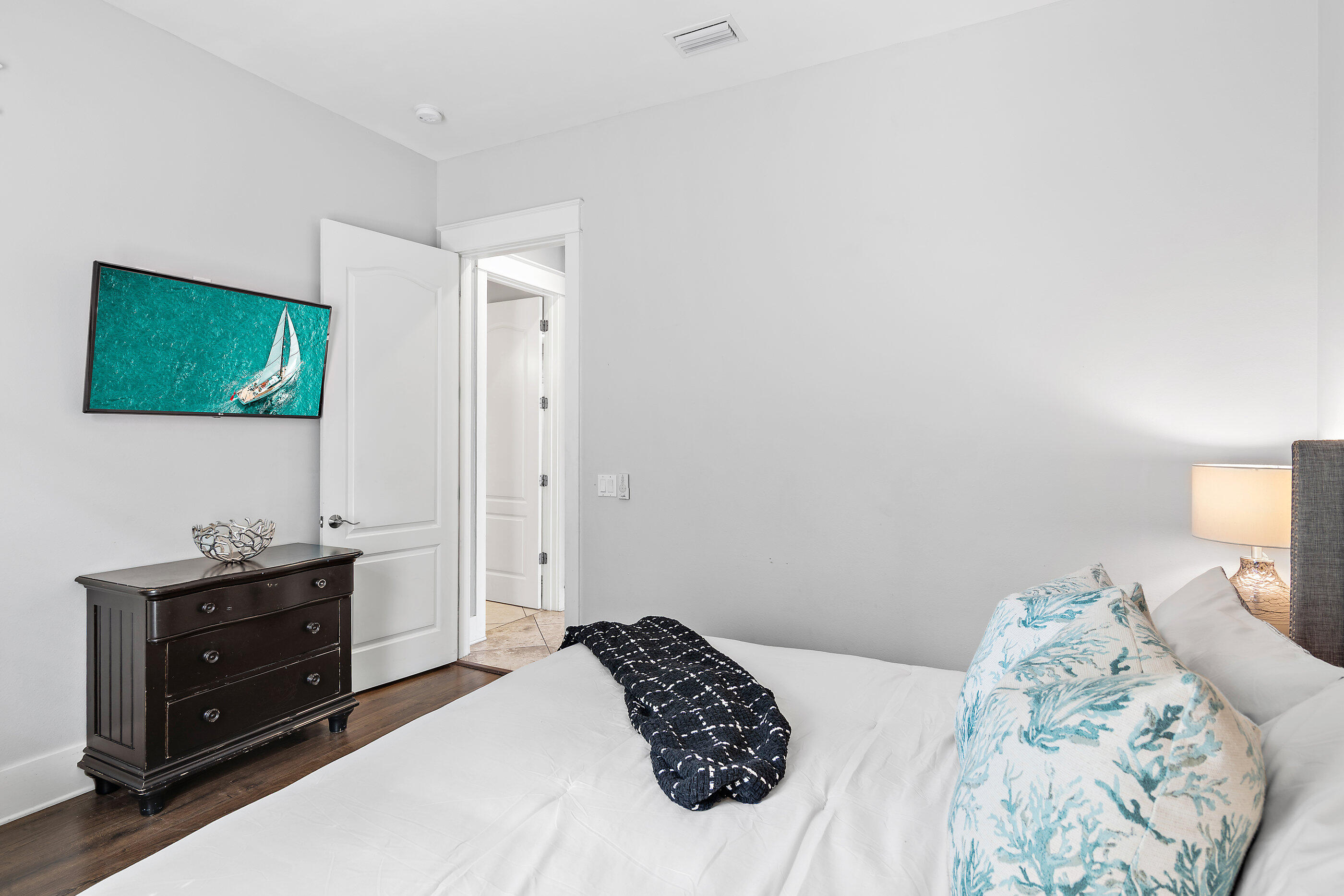 8 Dunes Estates Boulevard Santa Rosa Beach, FL 32459 - Photo 14 of 43 a bedroom with a bed and a flat screen tv