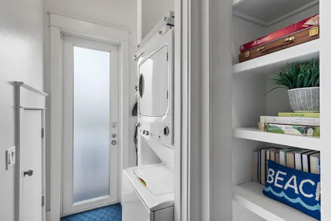 a bathroom with a shower sink and mirror