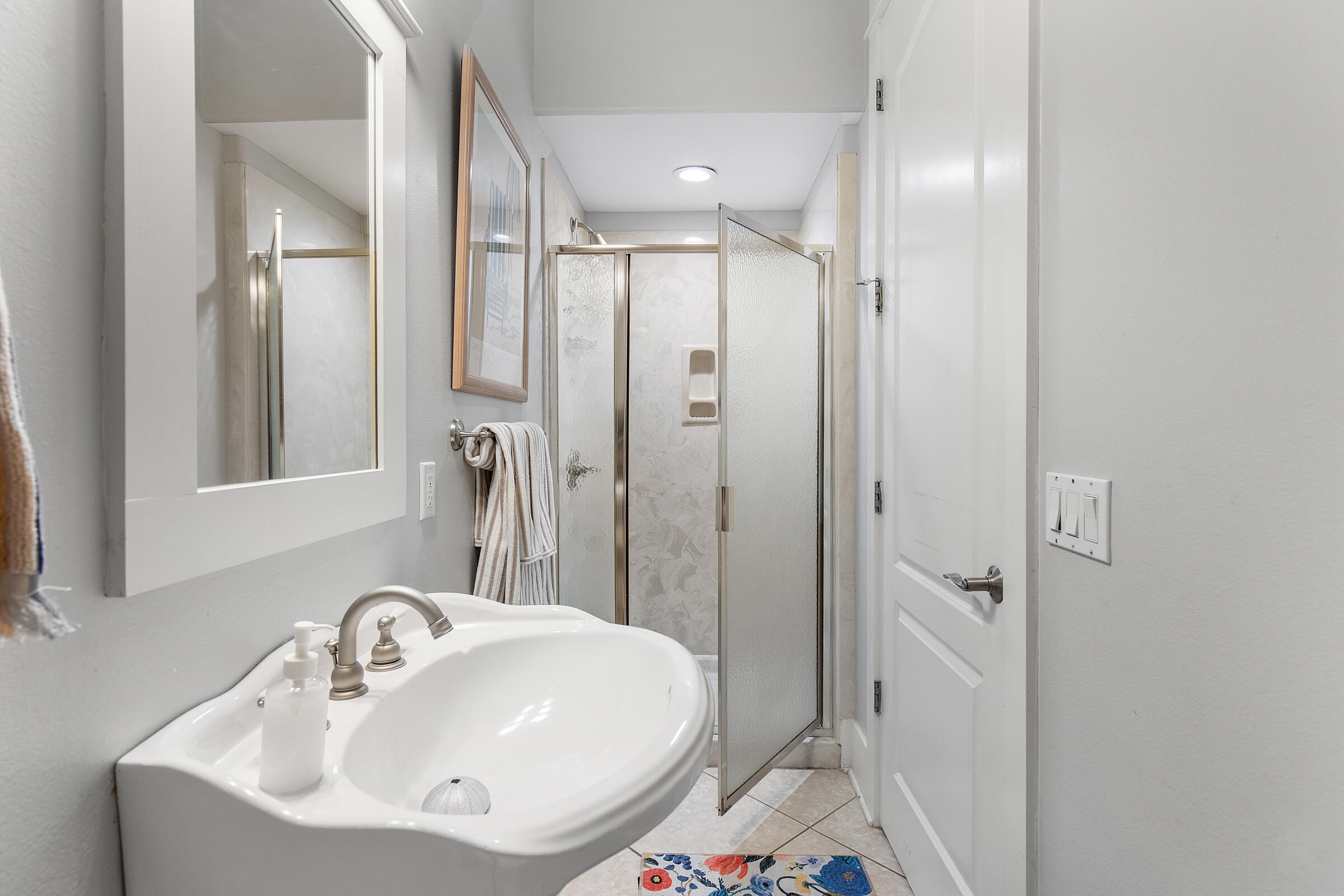 8 Dunes Estates Boulevard Santa Rosa Beach, FL 32459 - Photo 16 of 42 a bathroom with a sink and a mirror