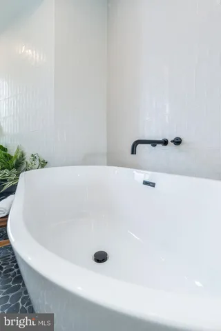 a front view of a building with a yard