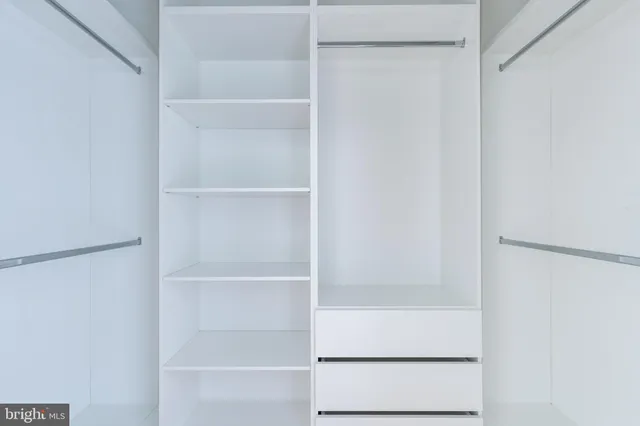 a view of a building with sitting area