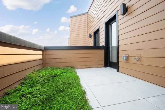 a view of a living room and entryway