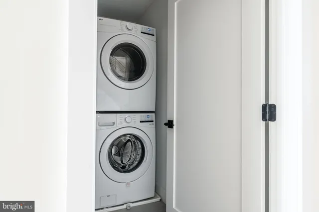 a view of backyard with swimming pool and outdoor seating