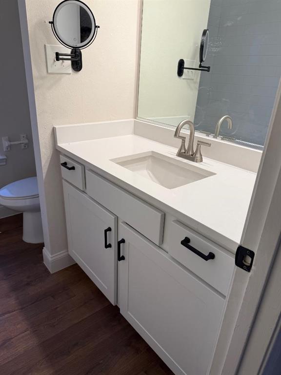 2017 Stein Way Carrollton, TX 75007 - Photo 13 of 18 a bathroom with a sink and a mirror
