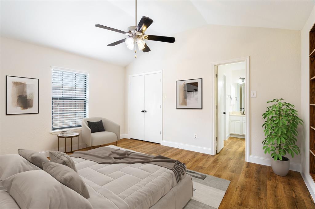 2017 Stein Way Carrollton, TX 75007 - Photo 6 of 18 a bedroom with a bed chandelier and a window