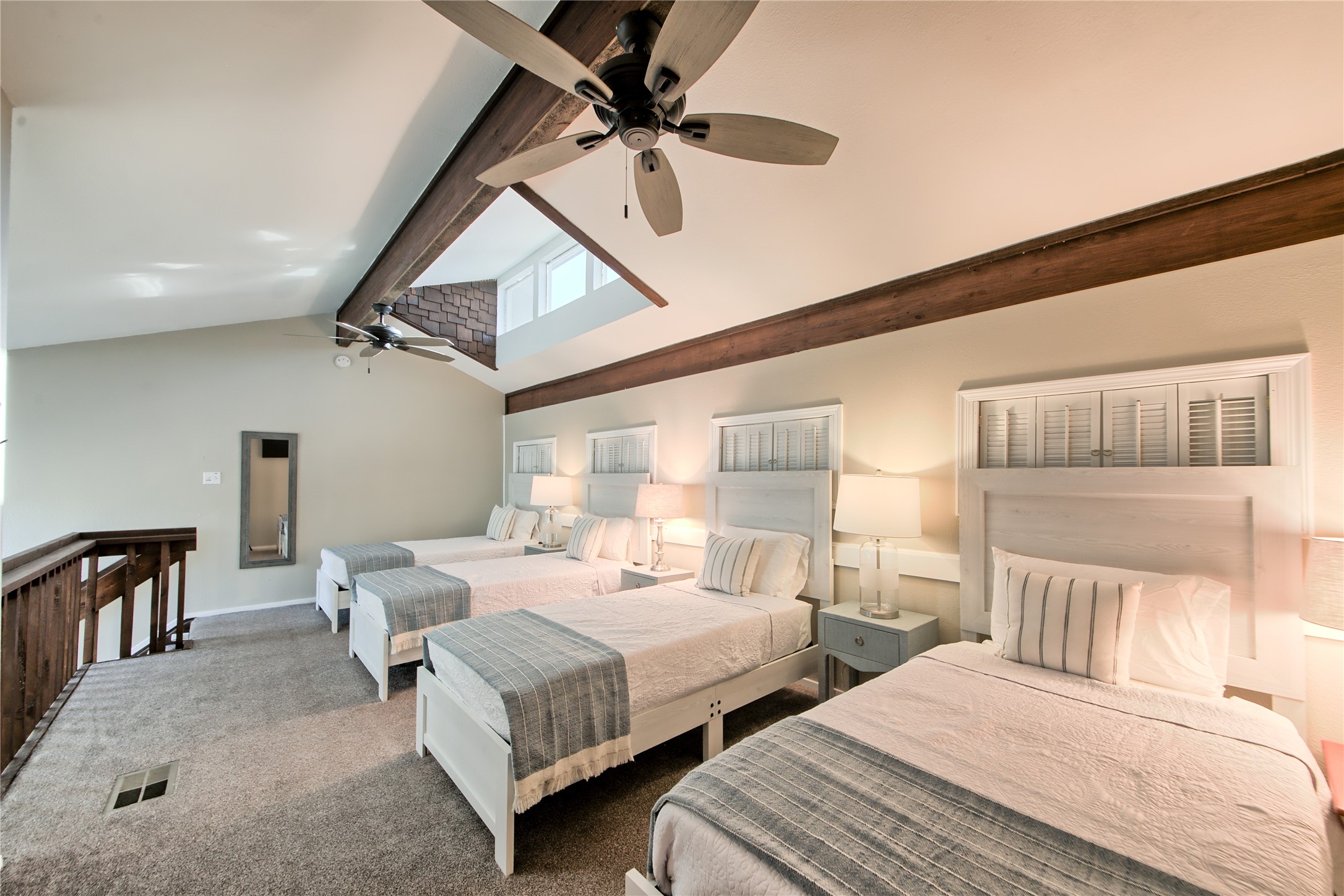 157 Comanche Point Leander, TX 78645 - Photo 24 of 36 a bedroom with two beds and ceiling fan