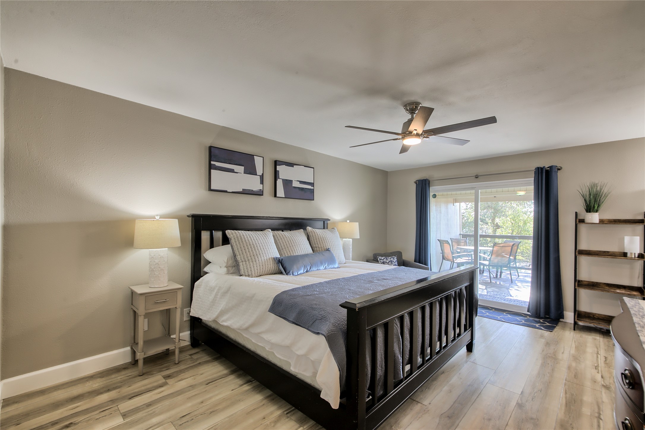 157 Comanche Point Leander, TX 78645 - Photo 27 of 36 a bedroom with a bed and a large window