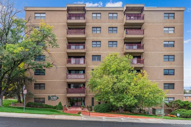 a front view of multi story residential apartment building