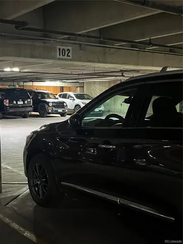 a car parked in front of a building