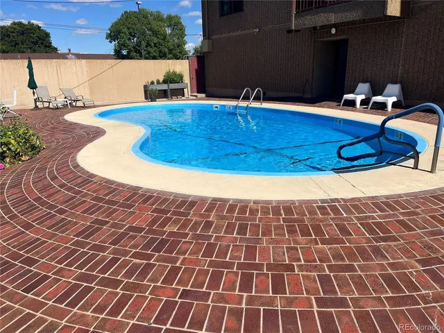 a swimming pool with a yard