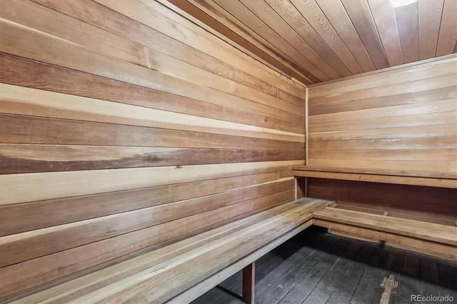 a dining room with furniture and a window