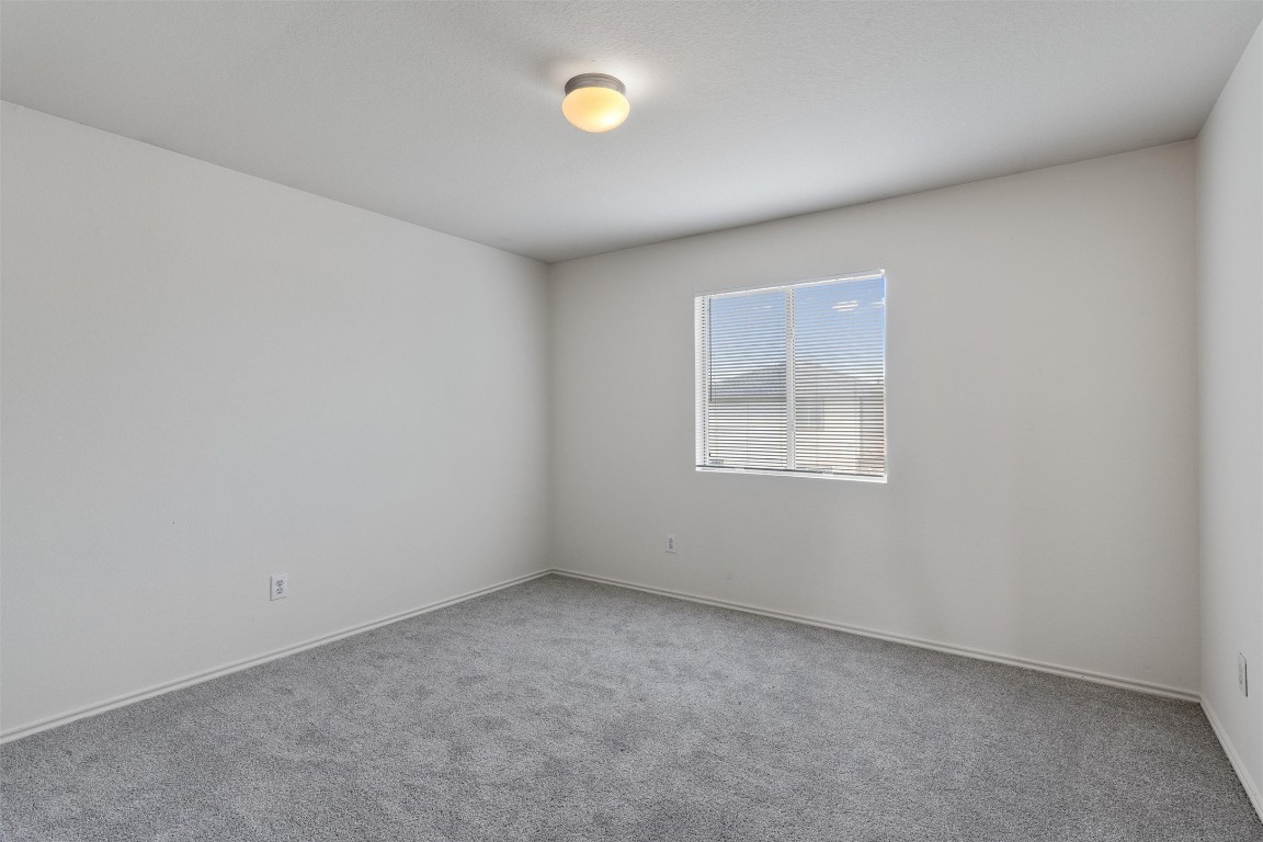 7432 Cayenne Lane Austin, TX 78741 - Photo 21 of 30 an empty room with a window