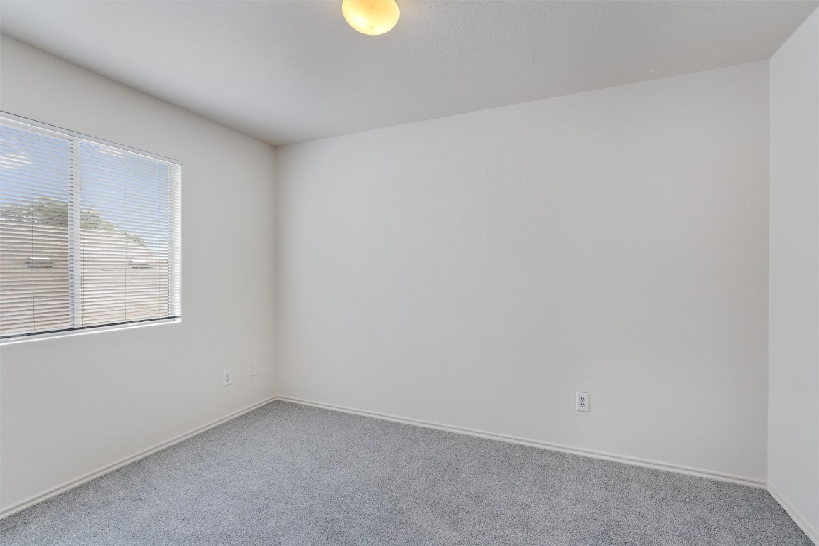 7432 Cayenne Lane Austin, TX 78741 - Photo 23 of 30 an empty room with a window