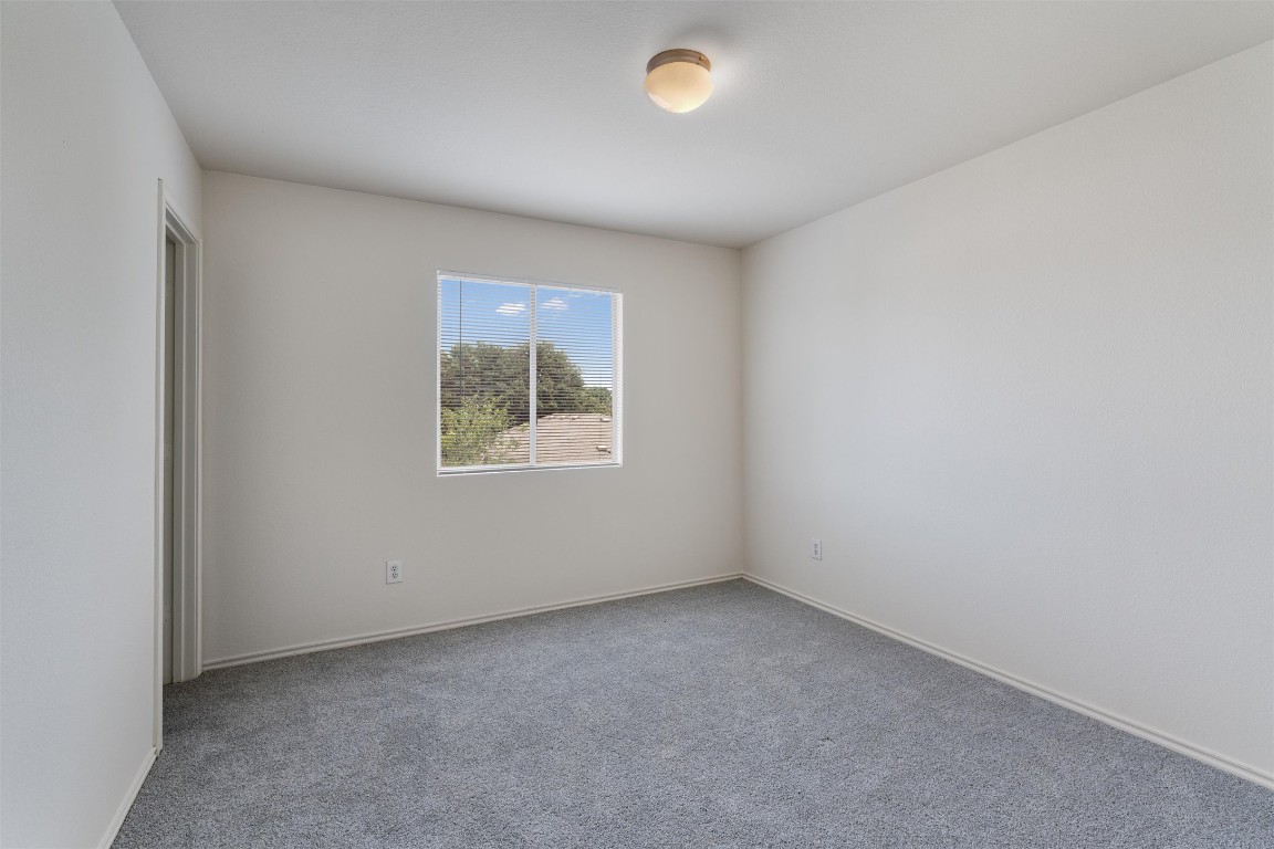 7432 Cayenne Lane Austin, TX 78741 - Photo 25 of 30 an empty room with a window