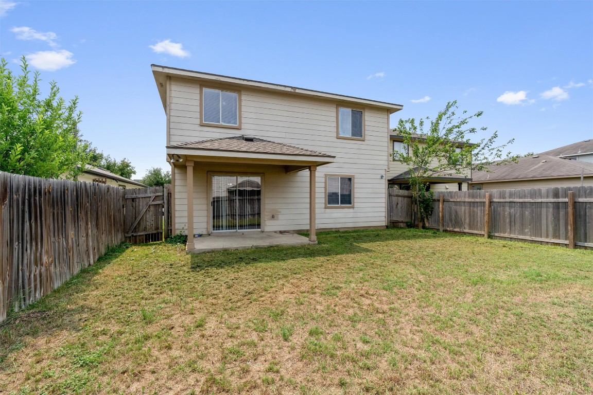 7432 Cayenne Lane Austin, TX 78741 - Photo 28 of 30 a view of a house with a backyard
