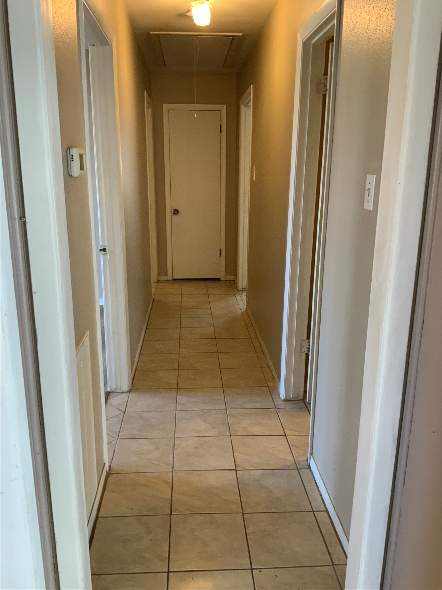 301 Travis Street Baytown, TX 77520 - Photo 20 of 37 Hallway to bedrooms