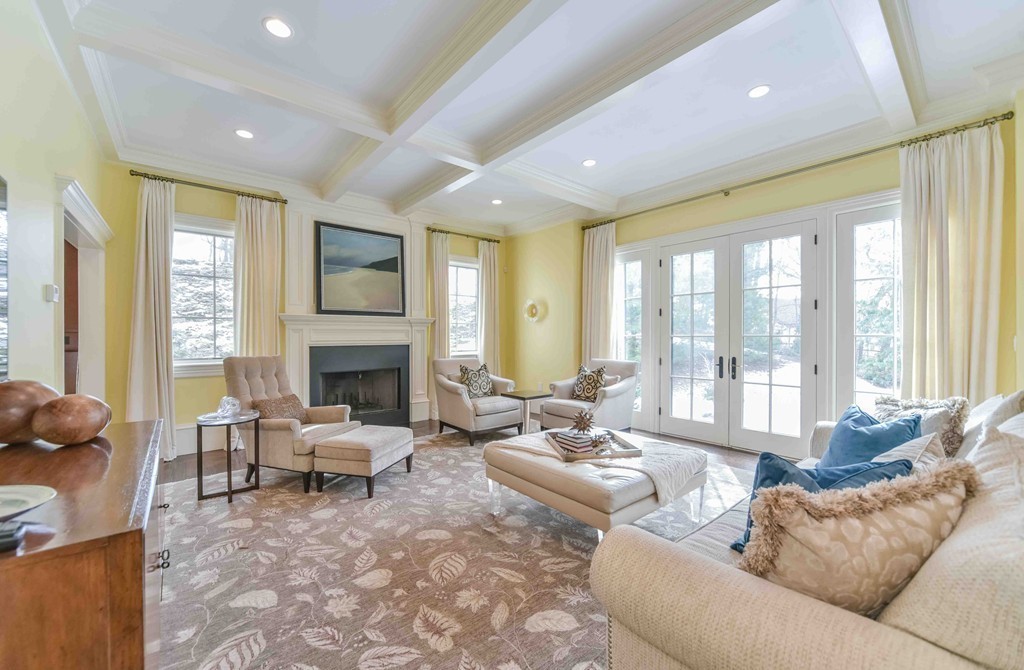458 Heath Street Brookline, MA 02467 - Photo 6 of 28 a living room with fireplace furniture and a large window