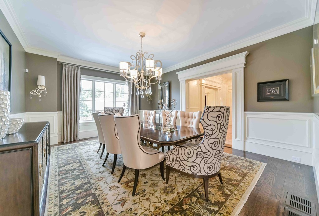 458 Heath Street Brookline, MA 02467 - Photo 7 of 28 a view of a dining room with furniture wooden floor and chandelier