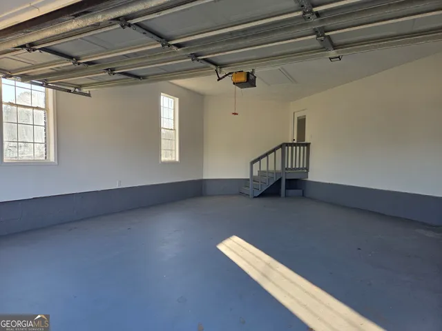 a view of a room with racks on the wall