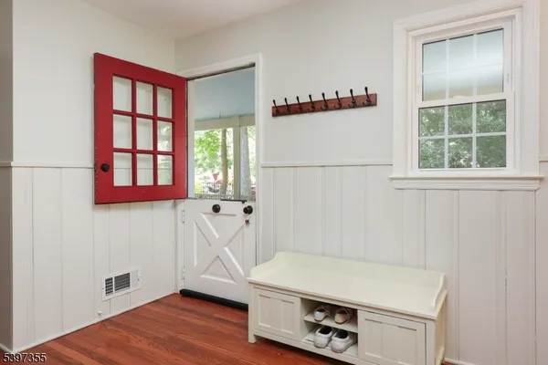 a room with window and a wooden floor