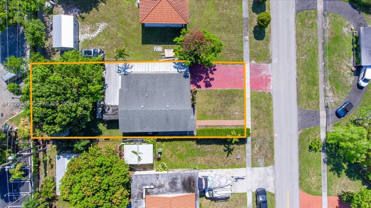 120 West 50th Street Hialeah, FL 33012 - Photo 22 of 22 an aerial view of residential houses with outdoor space and street view