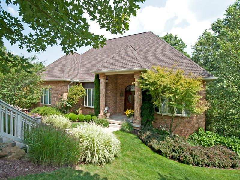 127 Hidden Valley Road Monroeville, PA 15146 - Photo 2 of 24 Exterior Front. Outdoor lighting on timers & Irrigation system for lawns & gardens. Mature trees border & fill remaining 2.5 acres creating a seamless scenic peaceful setting. Extra thick concrete drive. 1 M/4LL int/grg. Exterior Front. All brick w/corresponding quoin corners. Three 5-Panel Windows across front of home w/custom blinds. All Pella 4-Pane custom windows w/hidden screens. Whole house security system. Three Zone Heating & AC. Lifetime High Qualit