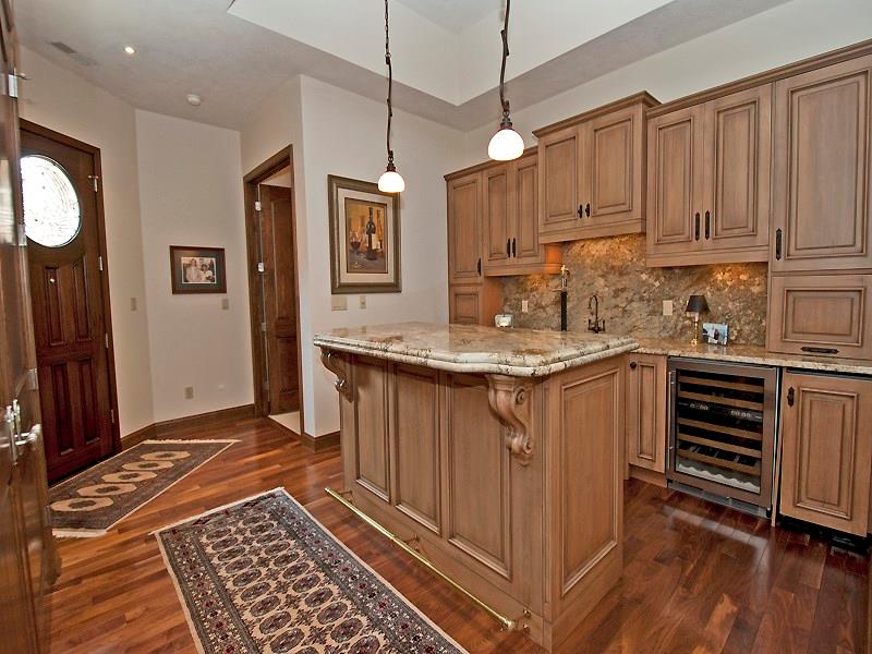 127 Hidden Valley Road Monroeville, PA 15146 - Photo 12 of 24 Equipped with a Wine Cooler, Beverage Refrigerator, Dishwasher for stemware, High Vol. Hotel Quality (Clear) Ice Maker, & Granite Sink w/Disposal. Tray ceiling w/hanging light fixtures.