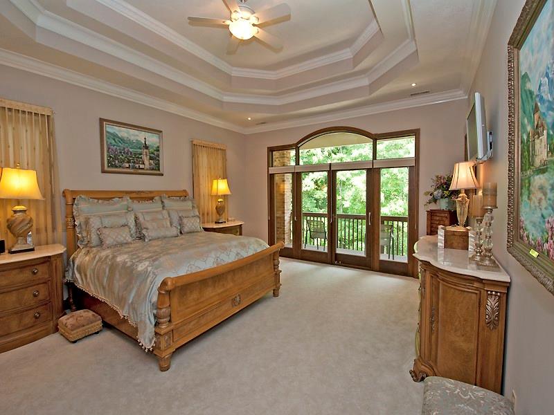 127 Hidden Valley Road Monroeville, PA 15146 - Photo 17 of 24 Amazing Master Bedroom! Crown molding, Double Tray Ceilings. Large sliding doors open to a Secure Trex Deck Balcony (90 sq. ft.). Huge WIC w/Pocket Doors w/Mirrored Back and sitting bench (negotiable).