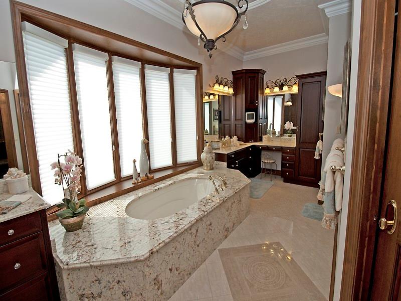 127 Hidden Valley Road Monroeville, PA 15146 - Photo 18 of 24 Master Bath/Spa. Jacuzzi tub w/granite surround, plaster moldings throughout, dome lighted ceiling & chandelier. Private toilet. Custom Blinds, Walk-In Shower w/Overhead Rain Shower & Handheld. Heated porcelain floors w/custom design medallion inlay. WOW F A N C Y!! Two Separate Vanities w/Sinks & Custom Cabinetry. Pocket door w/Mirrored Back.
