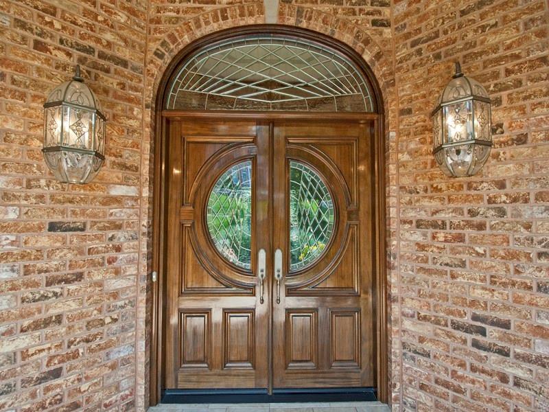 127 Hidden Valley Road Monroeville, PA 15146 - Photo 4 of 24 MAIN ENTRY: Portico is 11x12 w/brick columns, leaded glass fixtures and porcelain floor. Welcome guests through your double custom Mahogany doors. A 2nd main level entry is located near the upper garage. Home 95% Handicapped accessible.