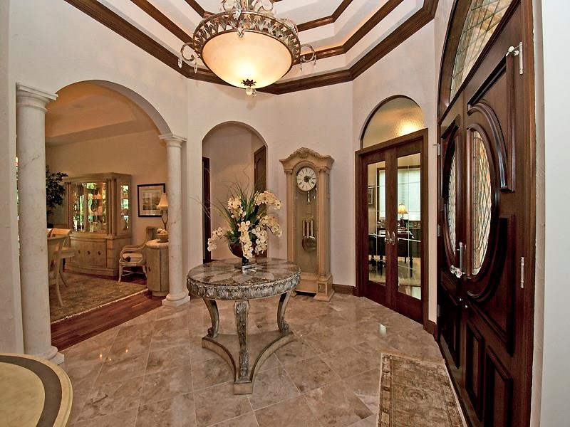 127 Hidden Valley Road Monroeville, PA 15146 - Photo 5 of 24 Entry/Foyer. 15x12 Octagon foyer w/gorgeous marble floors, limestone pillars, 4-layer tray ceiling w/Walnut moldings & Rope Lighting. Chandelier (not included in price but negotiable outside of closing). Center to all your spectacular destinations throughout this fabulous home. 10 ft. ceilings minimum throughout.