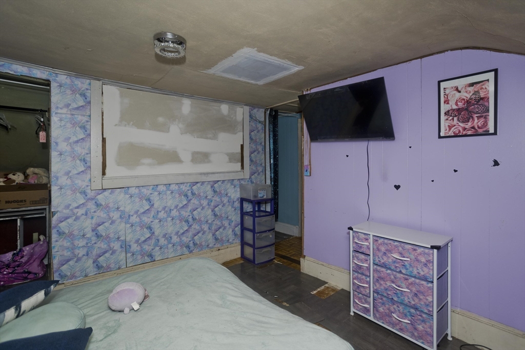 20 Prospect Street Adams, MA 01220 - Photo 16 of 27 a living room with furniture and a flat screen tv