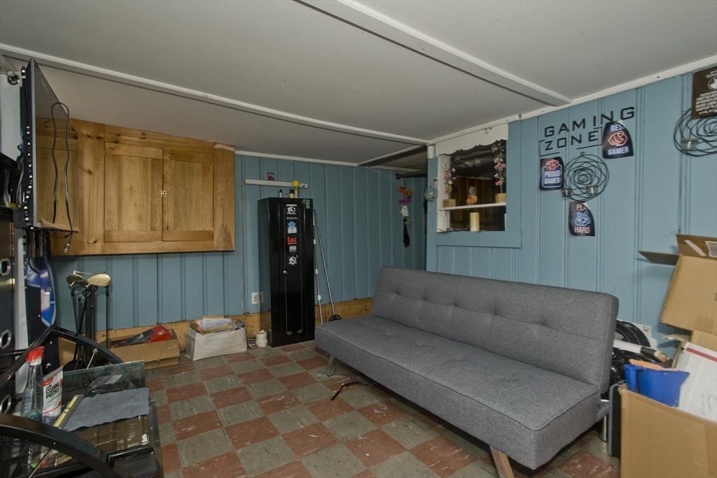 20 Prospect Street Adams, MA 01220 - Photo 24 of 27 a living room with furniture and a window