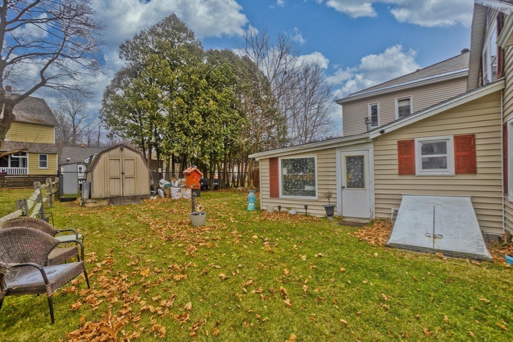 20 Prospect Street Adams, MA 01220 - Photo 26 of 27 a backyard of a house with table and chairs