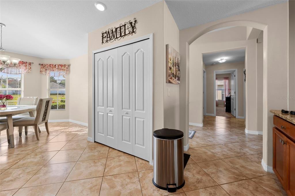 10114 Ives Loop Hudson, FL 34667 - Photo 23 of 49 a view of a hallway with seating area