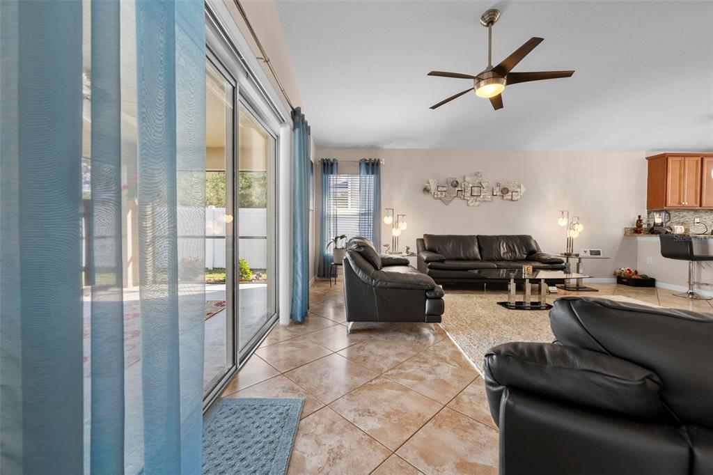 10114 Ives Loop Hudson, FL 34667 - Photo 33 of 49 a living room with furniture and a window