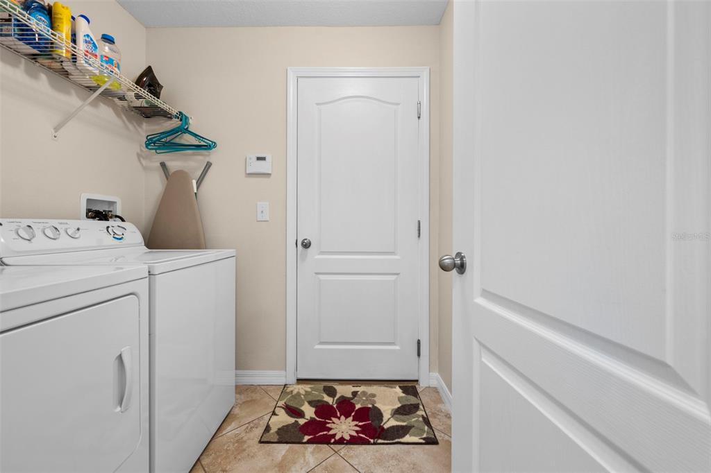 10114 Ives Loop Hudson, FL 34667 - Photo 41 of 49 a room with storage and utility