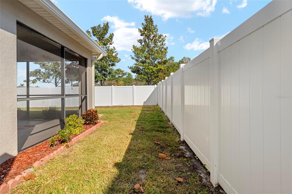 10114 Ives Loop Hudson, FL 34667 - Photo 45 of 49 a view of swimming pool with a patio